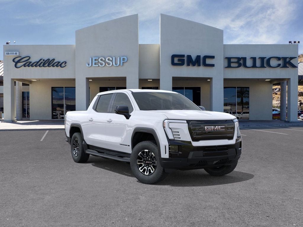 2026 GMC Sierra EV Elevation Standard Range in Summit White — front three-quarter view