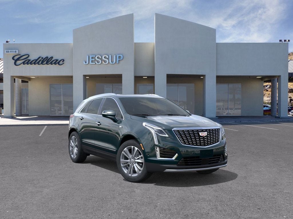 2026 Cadillac XT5 Premium Luxury in Emerald Lake Metallic — front three-quarter view