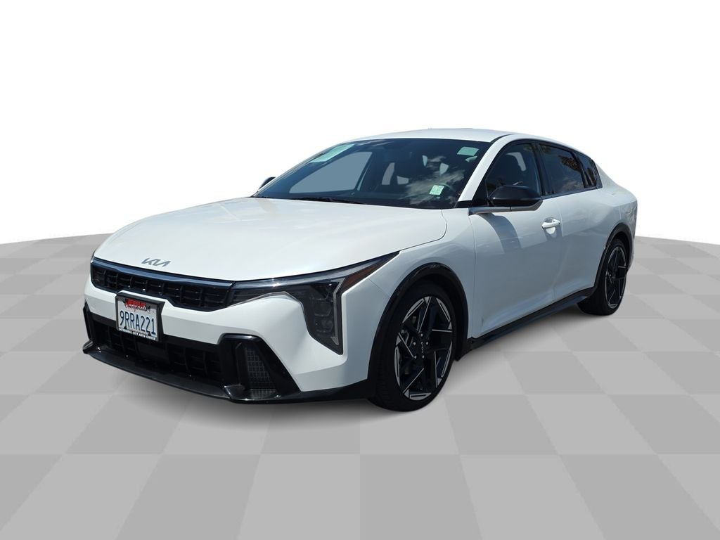 2025 Kia K4 GT-Line in White — front three-quarter view