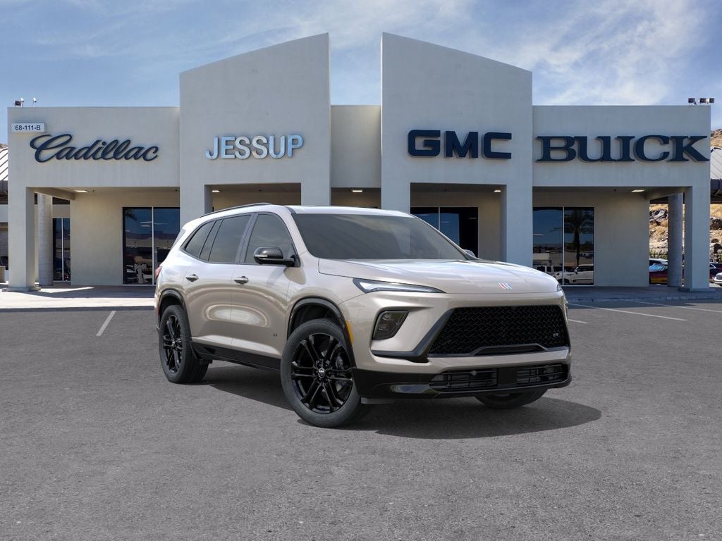 2026 Buick Enclave Sport Touring in Stone Metallic — front three-quarter view