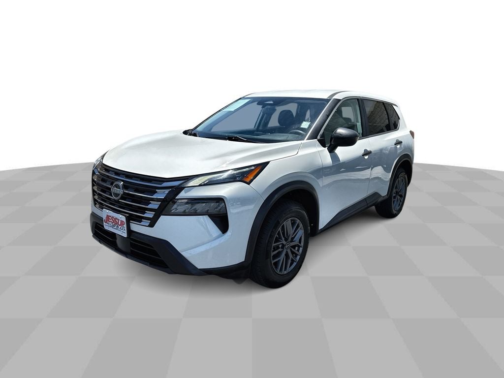 2024 Nissan Rogue S in White — front three-quarter view