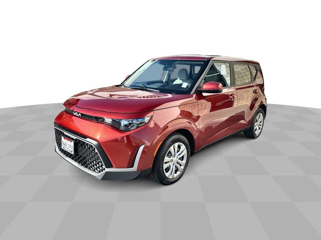 2023 Kia Soul LX in Orange — front three-quarter view